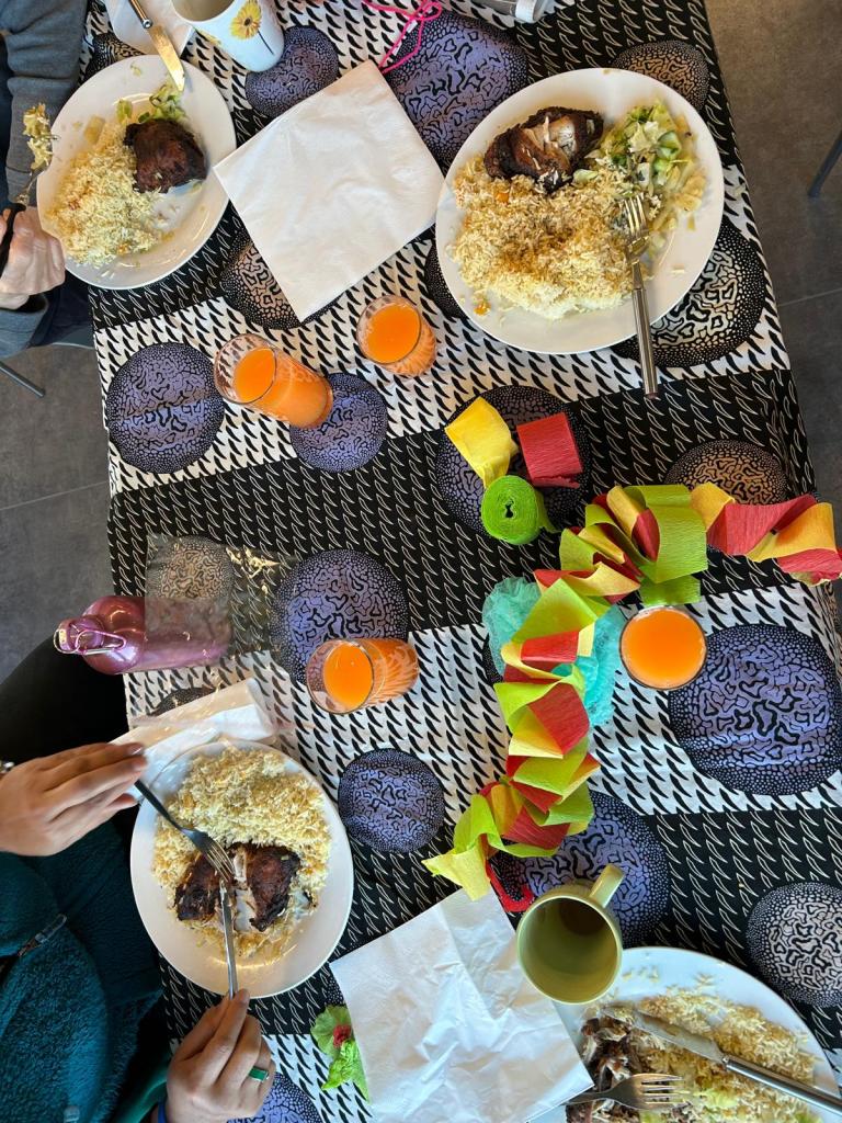 View from above of meals and drinks on dining table